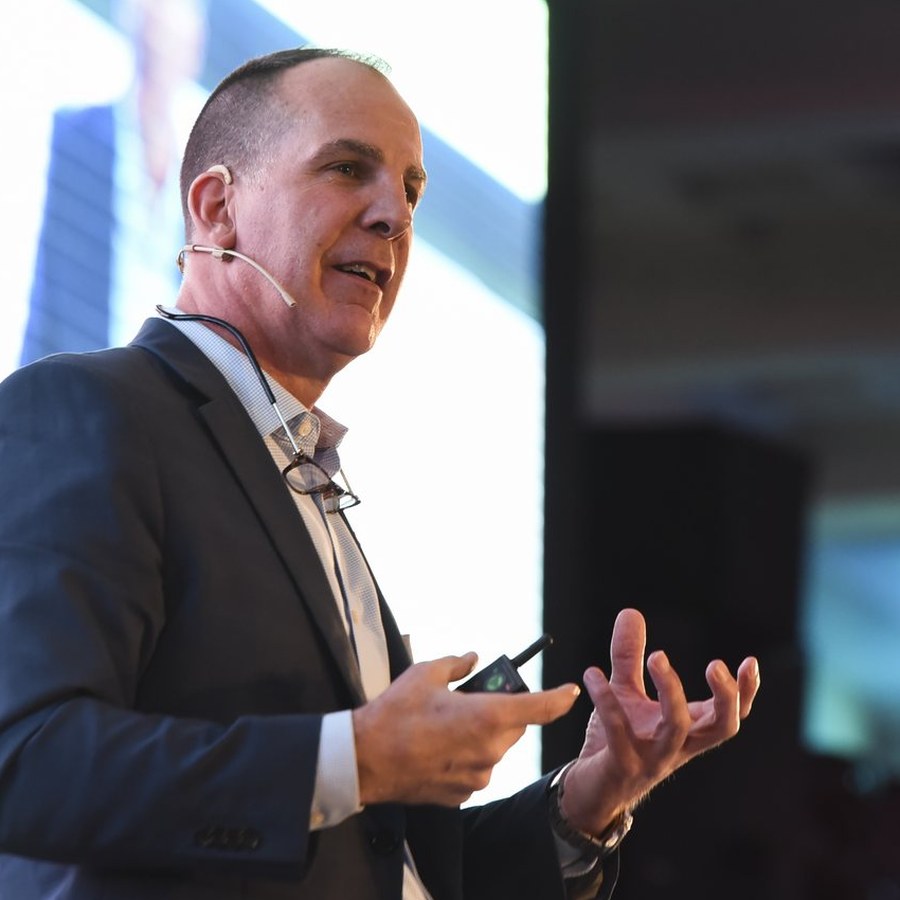 Gary Schoeniger speaking at a conference