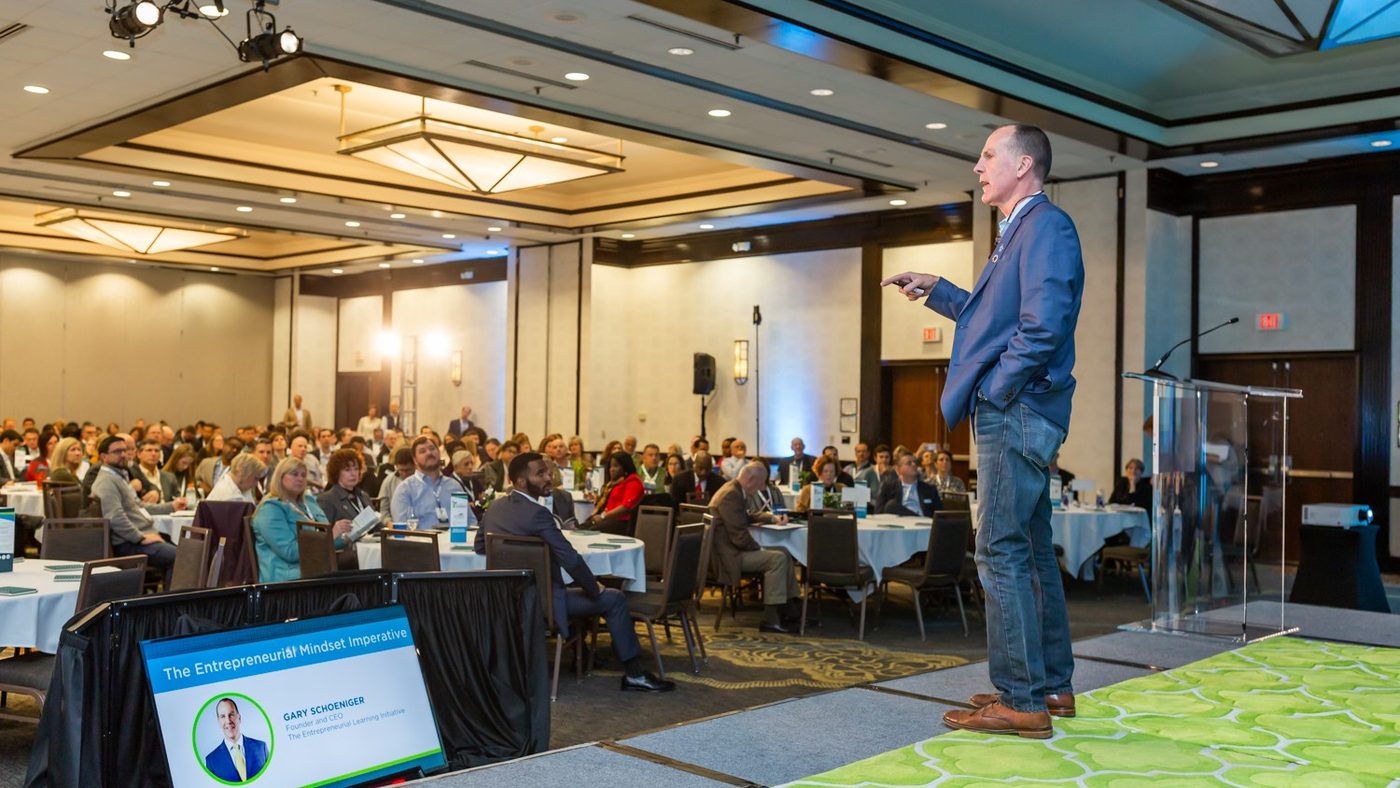Gary Schoeniger delivering a keynote to a seated audience